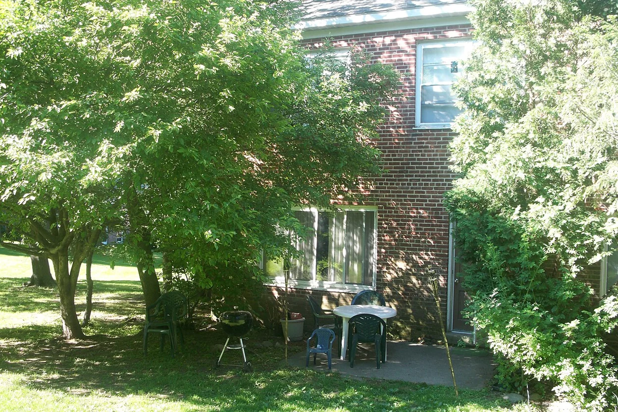 Shaded brick-townhouse patio, Massachusetts